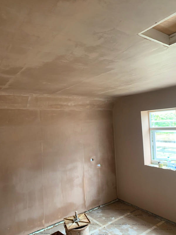 Large commercial space with plastered walls by Moorlands Plastering